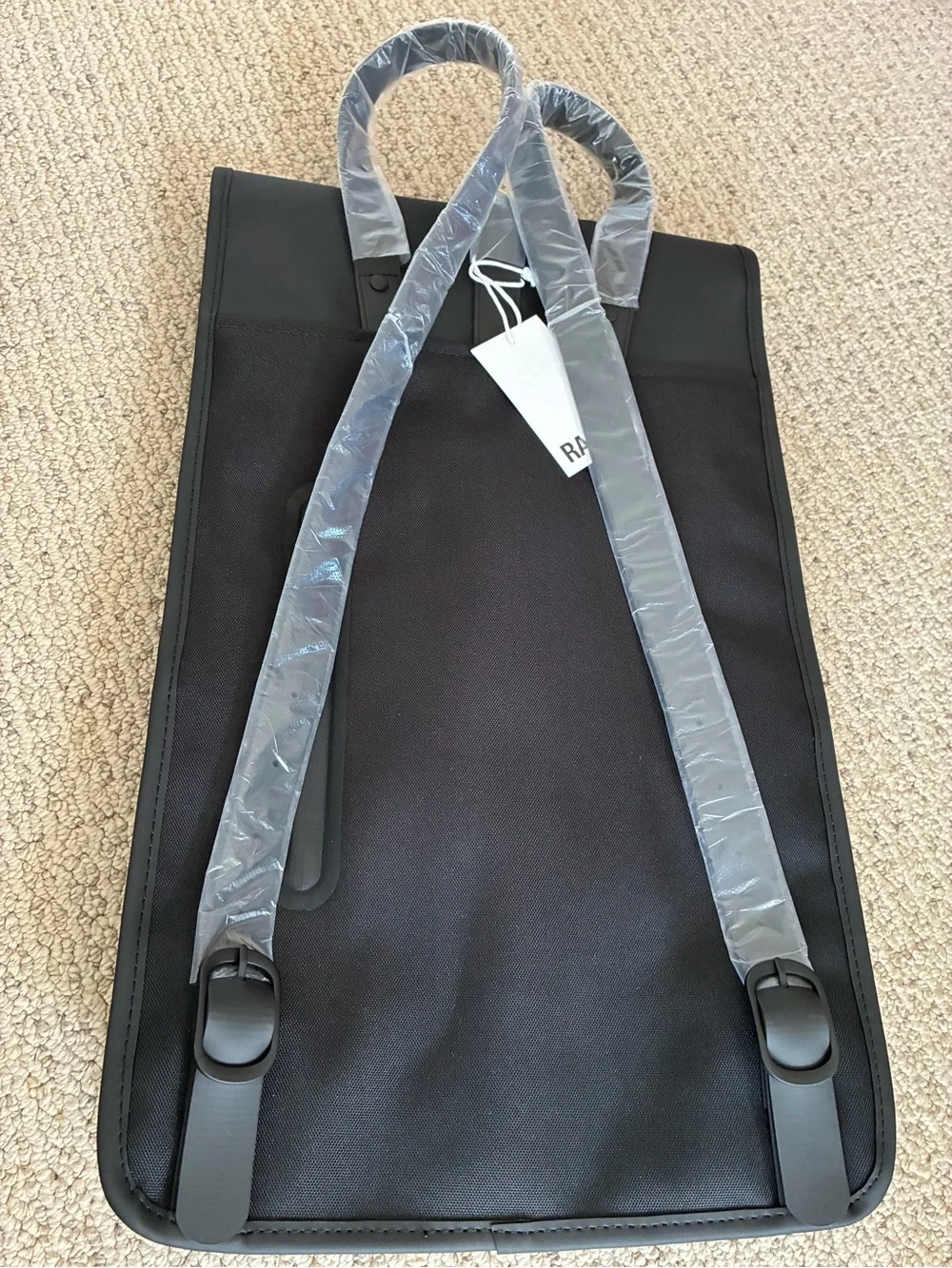 Rains Black Roll-Top Laptop Backpack
